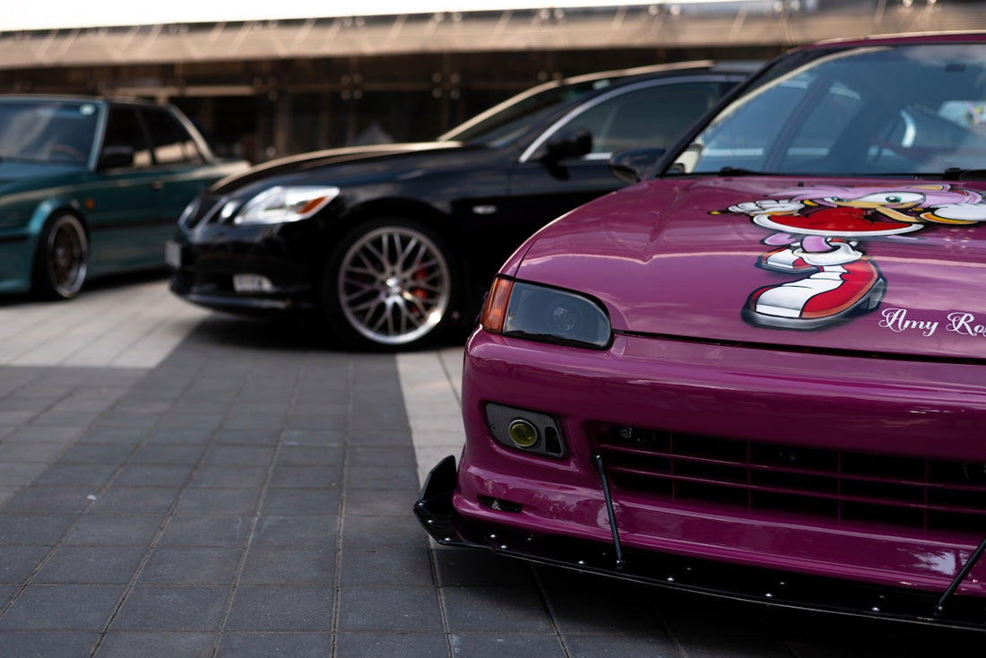 a group of cars parked in a parking garage