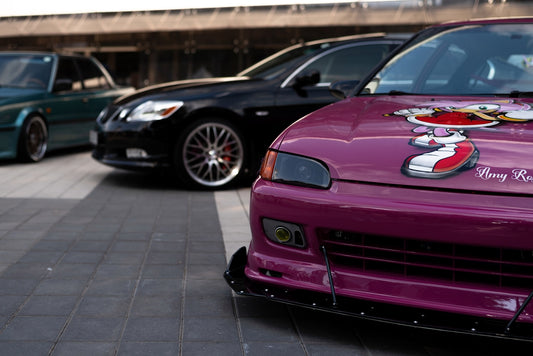 a group of cars parked in a parking garage